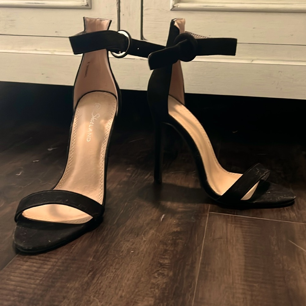 Size 8, black open toed heals.